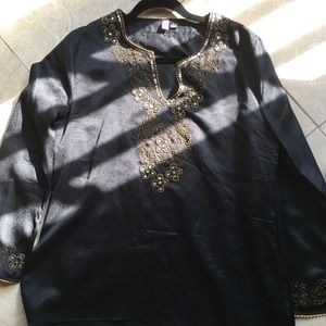 Gorgeous black ITSU with gol design around collar.